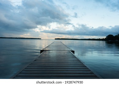 Dock on the lake in a rainy cloudy day