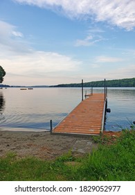 Dock Overlooking Great Pond In Belgrade Lakes, Maine. July 2019.