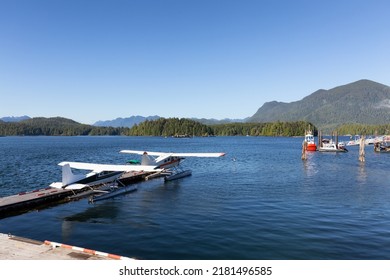 Dock And Seaplanes In The Harbour On A Sunny Afternoon On Vancouver Island. Summer Season. Tofino, British Columbia, Canada. Adventure Travel.