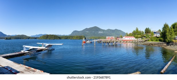 Dock And Seaplanes In The Harbour On A Sunny Afternoon On Vancouver Island. Summer Season. Tofino, British Columbia, Canada. Adventure Travel.