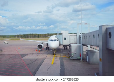 Docked Aircraft In The Helsinki Airport