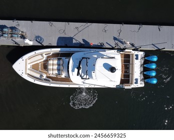 Docked Sport Fishing Boat with Outboard Engines