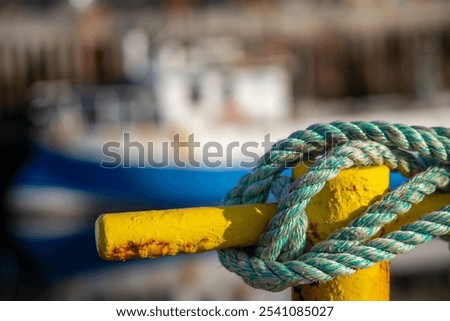 Similar – Image, Stock Photo Yellow fishing boat moored in ocean turquoise water