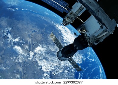 Docking spacecraft in outer space. Elements of this image furnished NASA. High quality photo