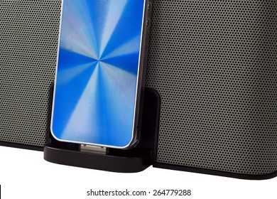 Docking Station With  Mobile Phone Isolated On A White Background