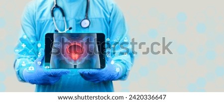 The doctor analyzes the simple x-ray of the male pelvis. the bladder and prostate are observed. Prostate cancer, bladder cancer, men's healthcare. Urologist with tablet.