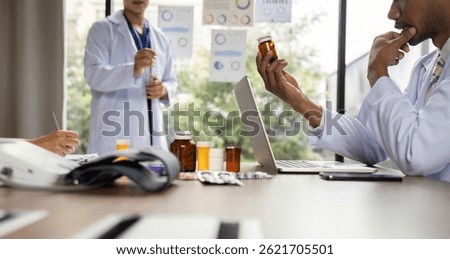 Doctor analyzing medication while discussing treatment options