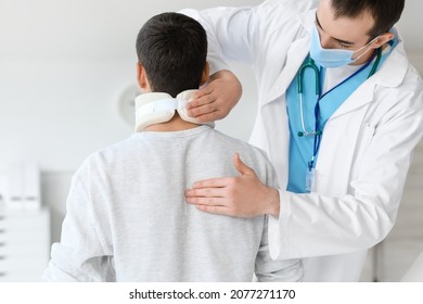 Doctor Applying Cervical Collar On Neck Stock Photo 2077271170 ...