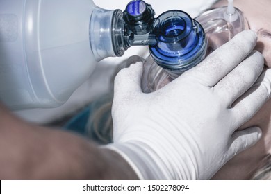 Doctor Applying First Aid Measures Using Stock Photo 1502278094