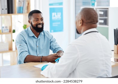Doctor, black man and healthcare consultation with a wellness and hospital worker in a office. Consulting, patient and happy male with a smile from health communication and expert advice in a clinic - Shutterstock ID 2284538279