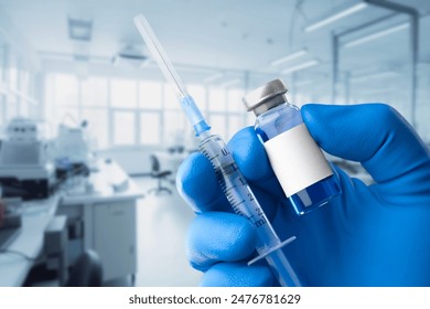 Doctor in blue protective gloves hold vaccine - Powered by Shutterstock