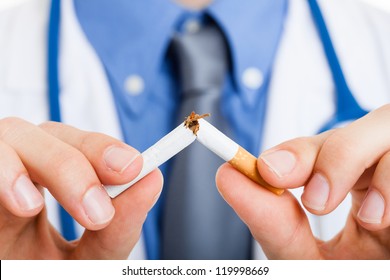 Doctor Breaking A Cigarette