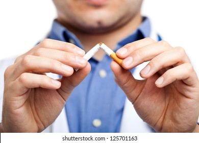 Doctor Breaking A Cigarette