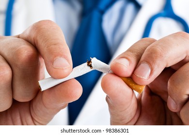 Doctor Breaking A Cigarette