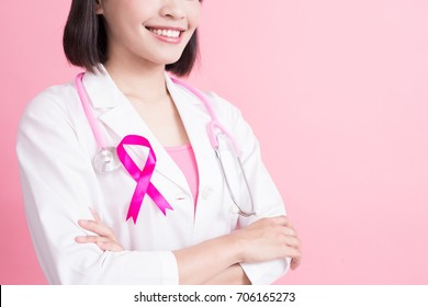 doctor with breast cancer prevent concept on the pink background