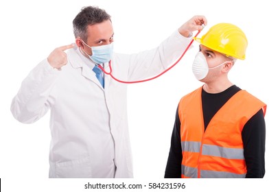 Doctor Checking Constructors Helmet With Stethoscope Like Being Silly Isolated On White Background