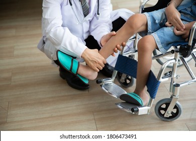 Doctor checking disabled person pateint leg at hospital, Muscle weakness - Shutterstock ID 1806473491