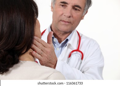 Doctor checking patient is well