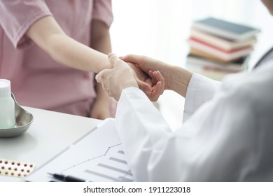 Doctor checking patient's hand pain
 - Powered by Shutterstock