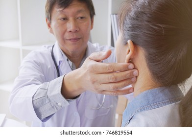 Doctor checking pulse woman patient for heartbeat. Health care concept. - Shutterstock ID 746819554