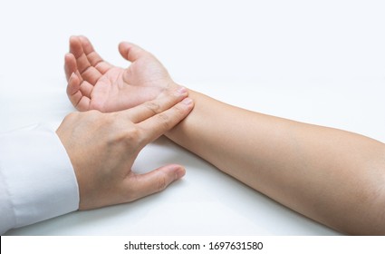 A Doctor Is Checking Radial Pulse Of The Patient That Has Palpitation. Vital Sign, Medical, Healthcare, Hospital, Physical Examination, Check Up Concept