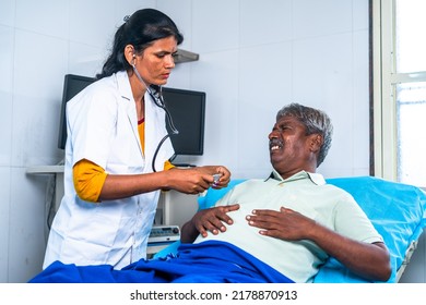 Doctor Checking Suffering Senior Man Chest Pain At Hospital Ward - Concept Of Health Care Treatment , Cardiac Arrest And Professional Occupation