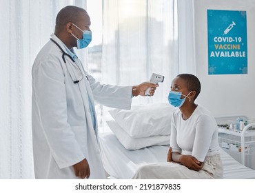 Doctor Checking Temperature Of Covid Patient While Testing For High Fever Symptoms Of Sick, Flu Or Illness. Screening Woman For A Healthcare Consult, Checkup And Visit In A Hospital Or Medical