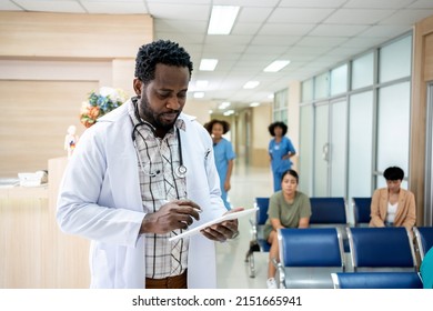 Doctor Checking And Writing About Patient's Health At Hospital. Health And Wellness.