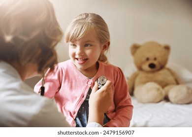 Doctor, child and stethoscope for clinic consultation, heartbeat instrument and healthcare woman or medical professional. Wellness, pediatrician and cardiology with girl, appointment and checkup - Powered by Shutterstock