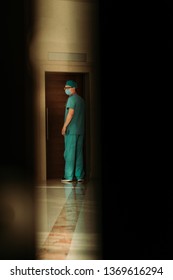 Doctor In The Clinic Through The Door