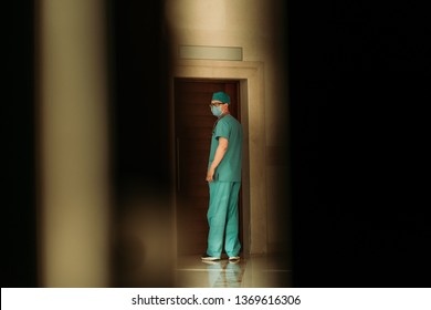 Doctor In The Clinic Through The Door