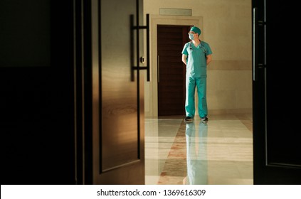 Doctor In The Clinic Through The Door