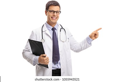 Doctor With A Clipboard Pointing Isolated On White Background