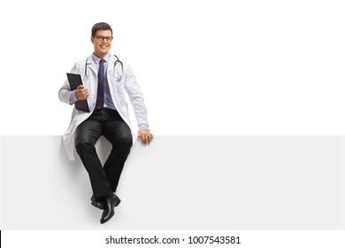 Doctor With A Clipboard Sitting On A Panel Isolated On White Background