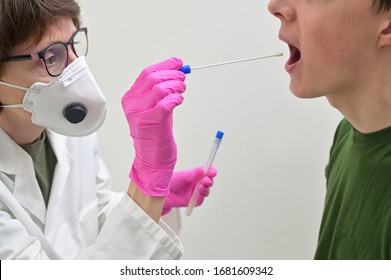 Doctor Collecting A Nasopharyngeal Nose And Throat Swab