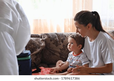 Doctor Coming Home In A Protective Suit