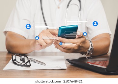 A doctor communicates via smartphone, illustrating the integration of modern technology in healthcare. Digital icons represent virtual consultations and real-time communication in telemedicine. - Powered by Shutterstock