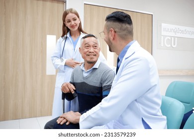 The doctor consults and encourages the old man patient. - Powered by Shutterstock