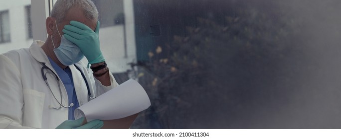 doctor desolate, desperate and sad at the medical reports of the virus or coronavirus