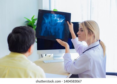 Doctor Diagnosing Patient Xray Stock Photo (Edit Now) 1241121892