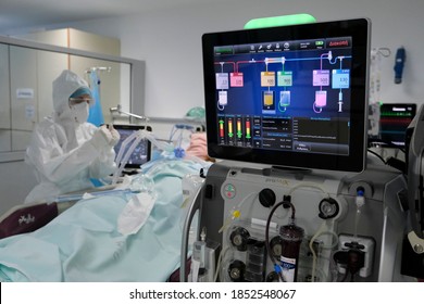 The doctor did an ultrasound of the heart at the intensive care unit for patients suffering from the coronavirus disease COVID-19 in Thoracic Diseases Hospital of Athens in Greece on November 8, 2020 - Shutterstock ID 1852548067