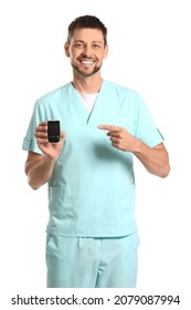 Doctor with digital glucometer on white background. Diabetes concept