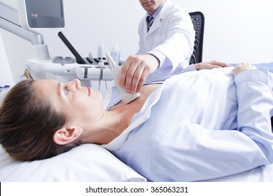 Doctor Doing A Doppler Sonography