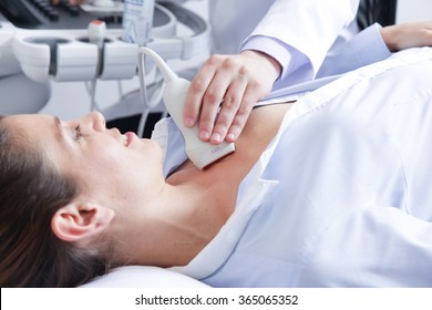 Doctor Doing A Doppler Sonography