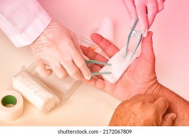 Doctor doing wound dressing care and bandaging patient's hand, Hand surgery treatment, Nurse treat patient's finger injury in hospital. - Powered by Shutterstock