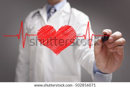 Doctor drawing ecg heartbeat chart with marker on whiteboard concept for healthcare and medicine