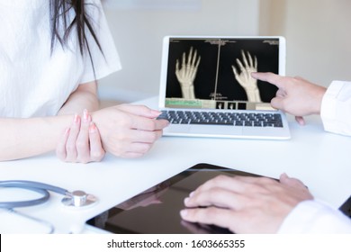 The Doctor Examined The Patient With Wrist Pain And X-ray Hand