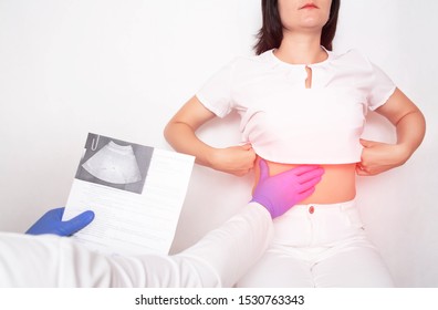 The Doctor Examines A Girl Patient With Fatty Hepatosis And Metabolic Disorders In The Liver, Cirrhosis