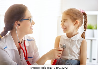 Doctor Examining A Child Girl In A Hospital