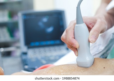 Doctor is examining heart's patient by echocardiogram for diagnosis disease or explain symptom. Medical exam , ultrasound. Healthcare and Medical equipment concept.